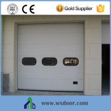 security industrial sectional door with walker door
