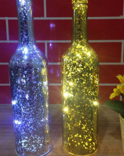 Electroplating ground silver LED glass bottle candle holder