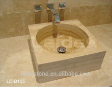 Beige travertine bathroom countertop basin