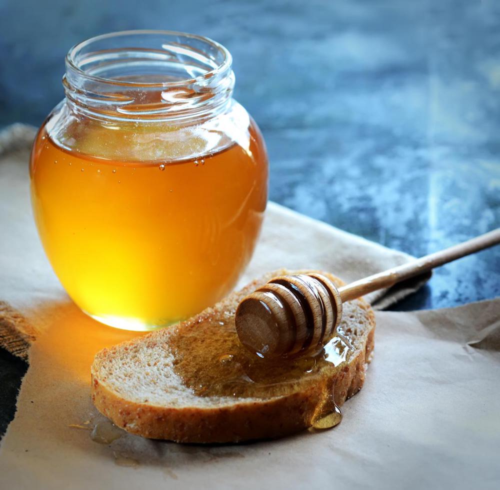 صحية عسل النحل عباد الشمس النقي الأصلي