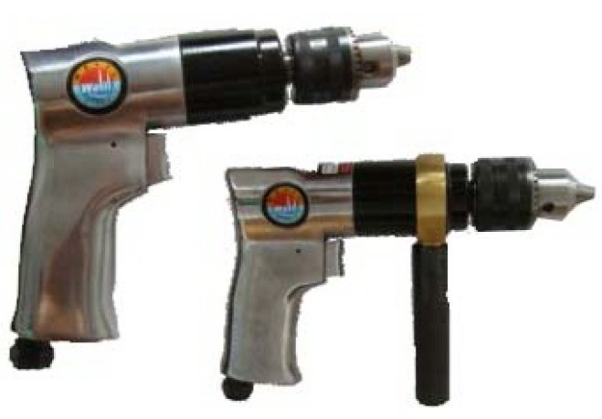 Reversible pneumatic hand drill