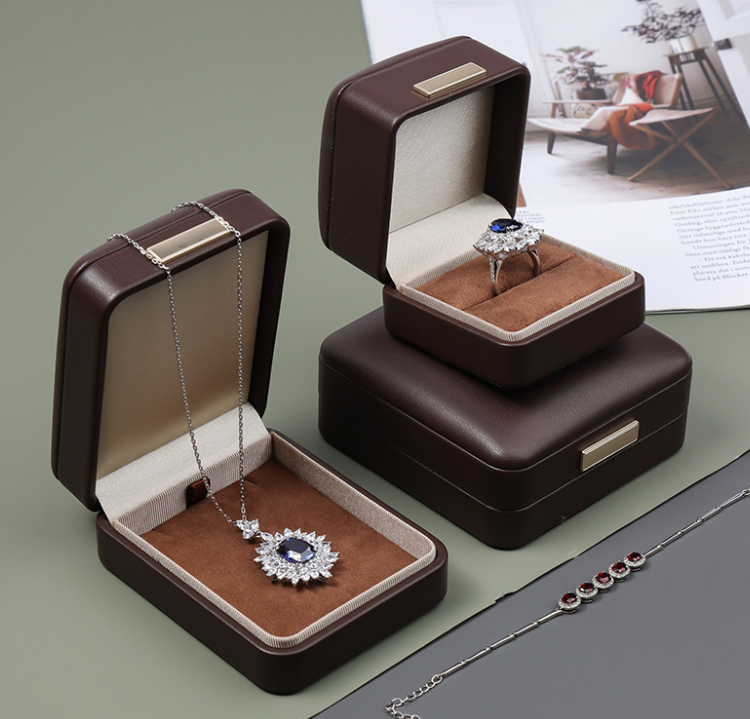 Boîte à bijoux Boîte en cuir renouvelable Texture en cuir Boîte de bijoux Boîte à collier
