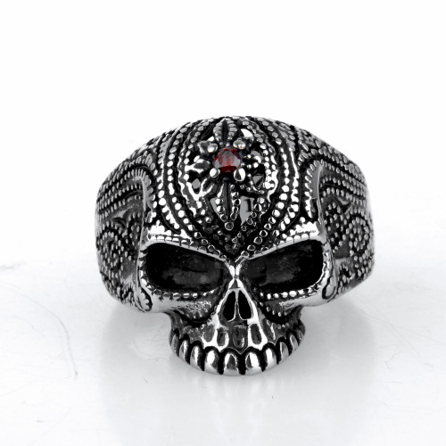 Polished electroplated skull ring with ruby