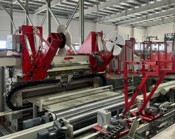 Automatic paper roll wrapping machine with Kraft paper