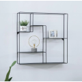 Metal wall-mounted shelf for interior decoration