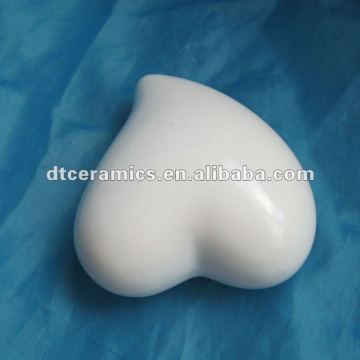 white ceramic heart