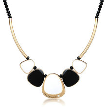Black and white ornament pendant necklace with gold plated