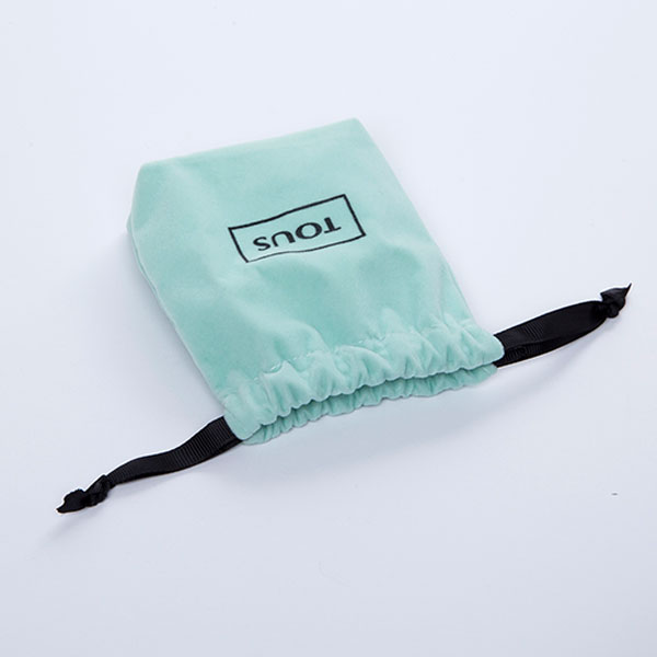 mint green mini velvet pouch with black string 