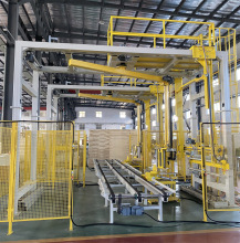 Rotary Arm Wrapper with Top Sheet Dispenser