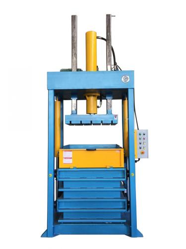 Vertical clothes textile baling compress