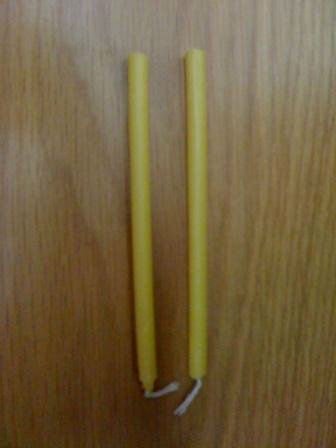 yellow taper religious  church  beewax candle