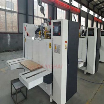 Corrugated paper stitcher machine