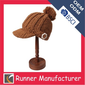 fashion knitted hat with visor and pom pom