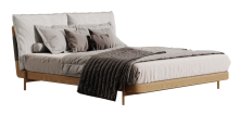 A soft bed made of simple wood, cotton and linen