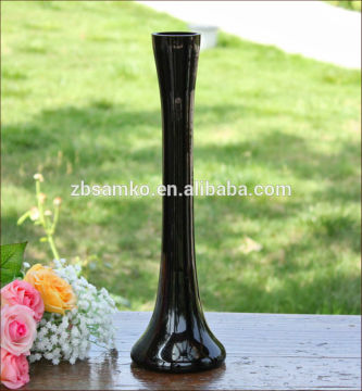Tall black glass vase