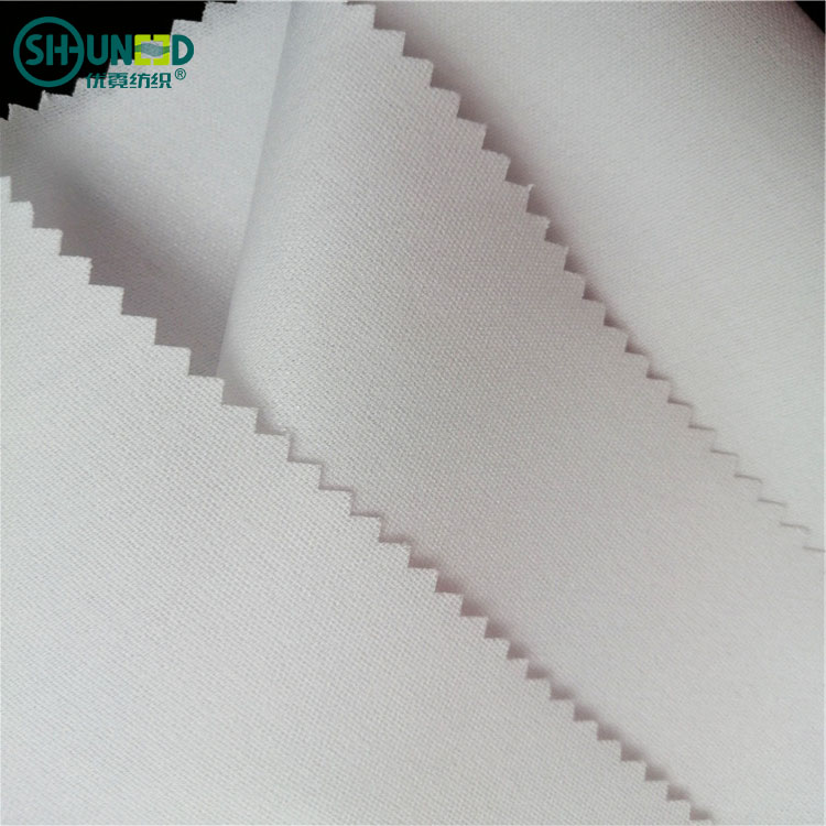 China Wholesale Manufacture Hard Shirt Interlining 100% Polyester 155gsm Fusible Collar Lining for Men Shirt