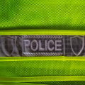 Gilet LED a emissione di luce verde fluorescente della polizia