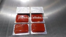 Sour cherry jam in portion packing machine