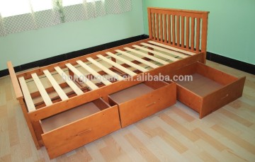 wooden single bed with drawers