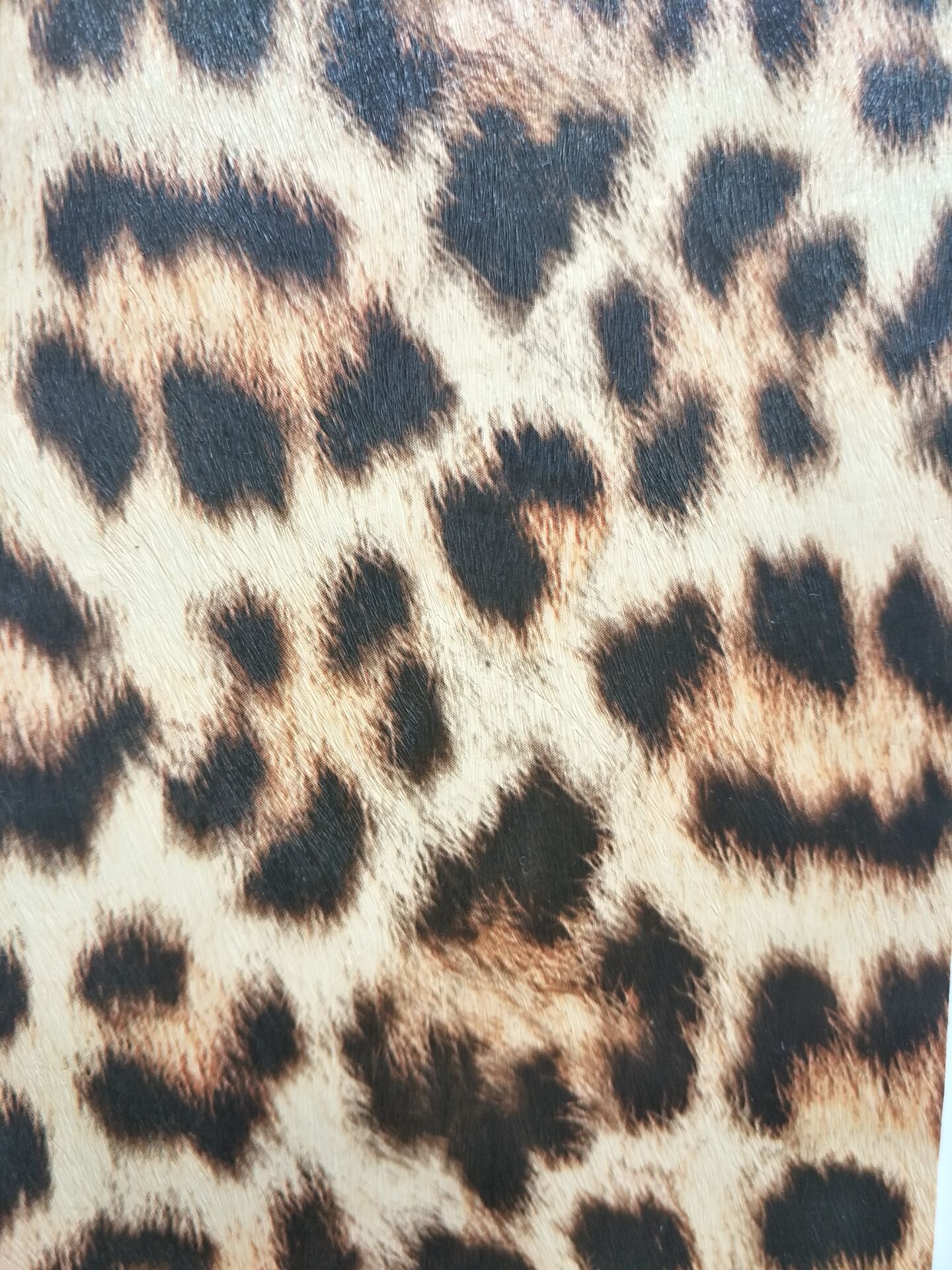 Bedrucktes kleines Leopardenmuster PU-Leder Printed small leopard print PU leather