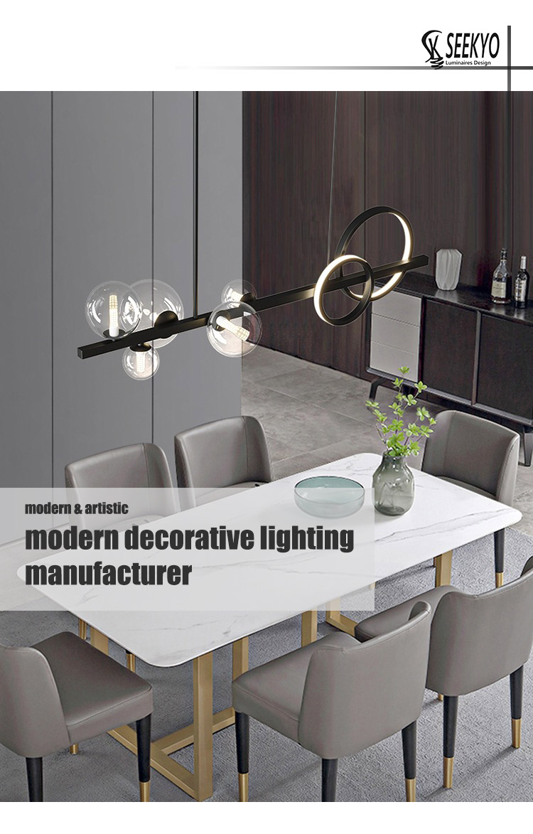 The sleek black iron body and the clear G4 glass balls create a unique balance, blending industrial and chic design elements. The sleek black iron body and the clear G4 glass balls create a unique balance, blending industrial and chic design elements.