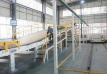 SMOOTH-RUNNING UP DOWN STACKER FOR CORRUGATED BOARDS