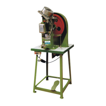 AUTOMATIC SNAP FASTENING MACHINE