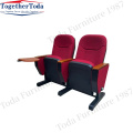 Cinema chair with foldable cushion and cup holder