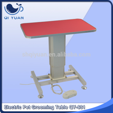 Electric elevating pet grooming table