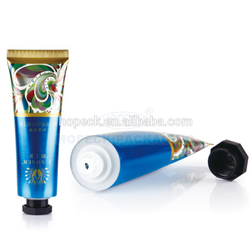 Round plastic tube with octagonal cap