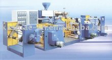 Film spraying and compounding machine