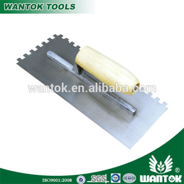 Hand tools plastering trowel with big square teeth