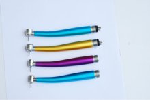 Push button dental handpiece