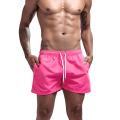 Les shorts classiques roses masculins prennent en charge le logo personnalisé