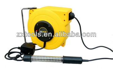 Power extension retractable cable reel with LED work light