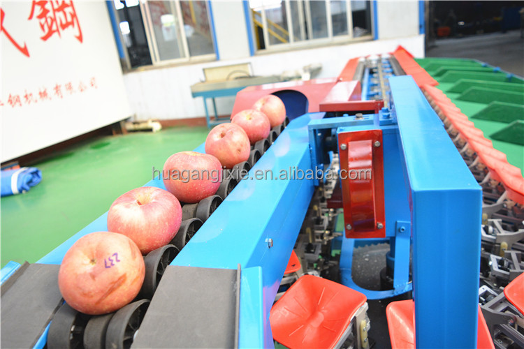 Automatic tomato fruit weight sorter pomegranate sorting machine mandarin and orange grading sorting machine.