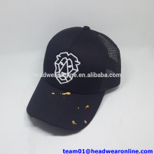 cotton and mesh trucker hat with destroyed holes