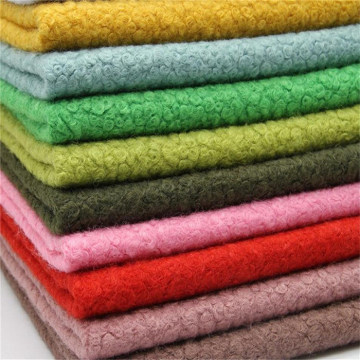 Knitted boucle wool polyester fabric