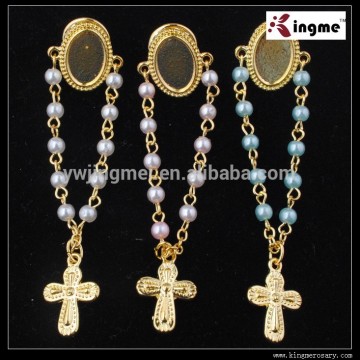 Gold plated religious pin brooch