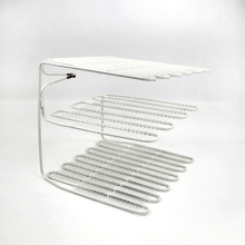 Refrigerator Shelf Evaporator with Round Tube Effusion Tube