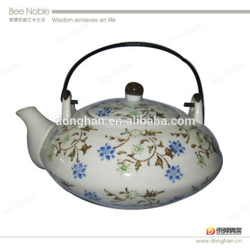 Chinese pocelain tea pot with flower and cuostomer design