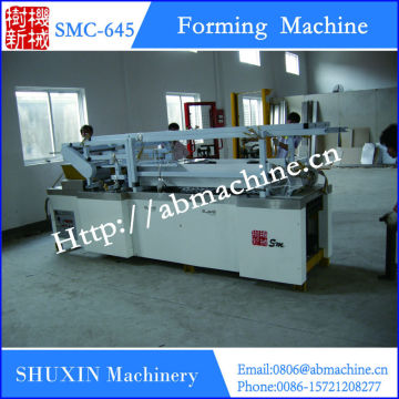 Cereal bar forming machine