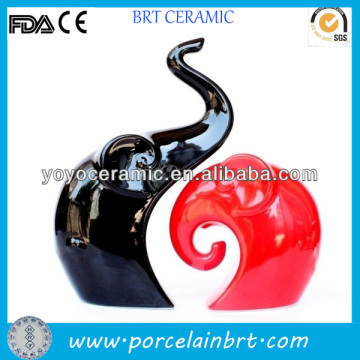 Elephant shaped ceramic red and black wedding decorations