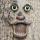 ट्री हग्गर मूर्तिकला पेड़ का चेहरा बर्डफीडर