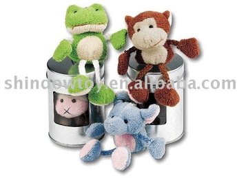 tin box with plush toy
