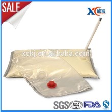 Laminated multiple layer aseptic dairy packaging bag