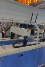 Economic type auto garment folding and bagging machine