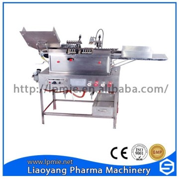 Ampoule filling and sealing machine