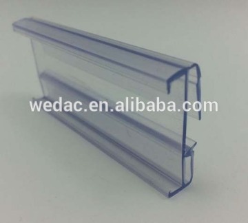 Electronic supermarket shelf label holder strip