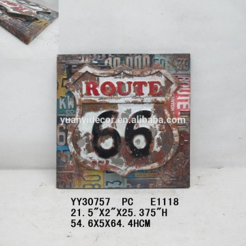 Vintage embossed metal US route 66 sign